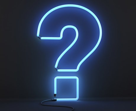 Glowing neon question mark sign